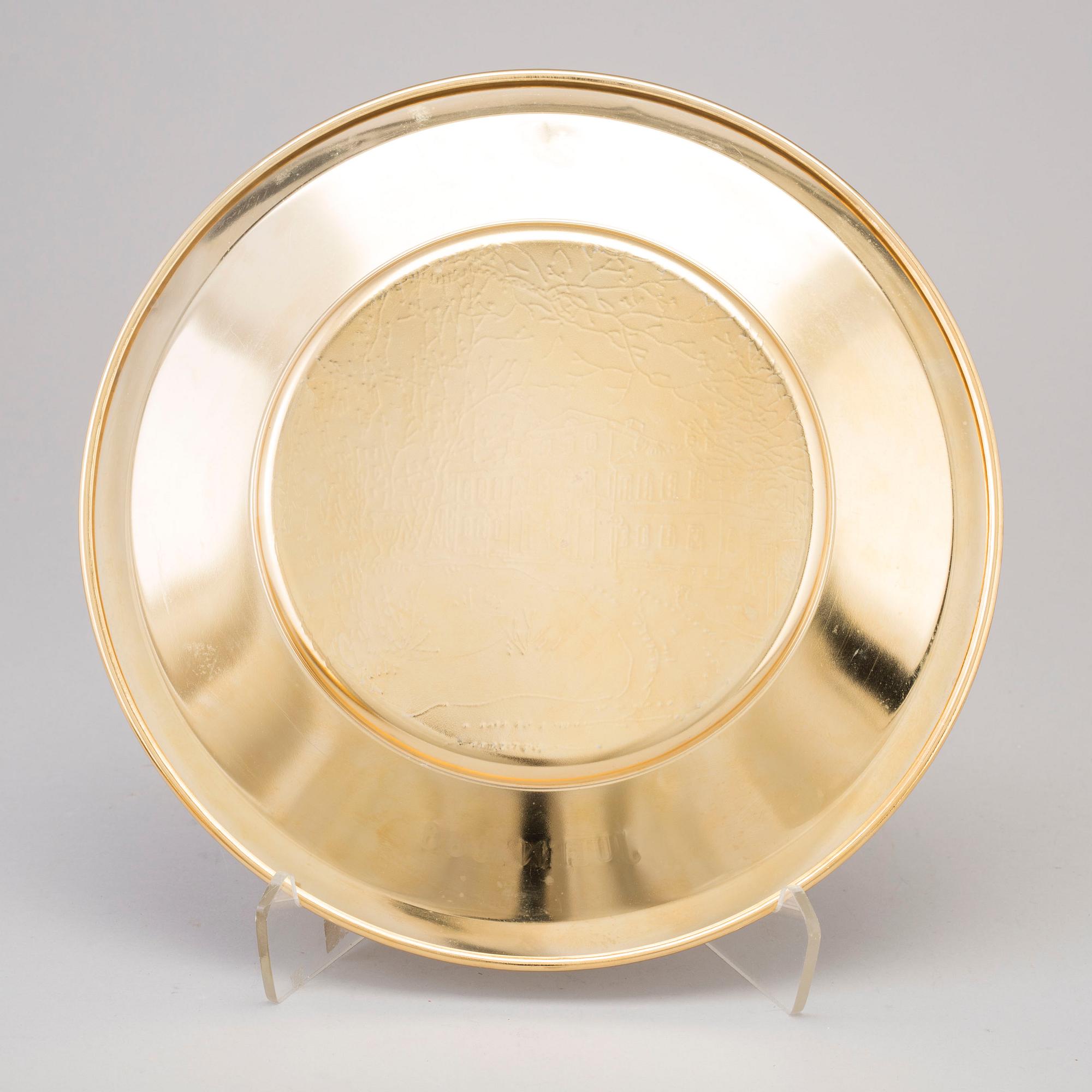 12 brass plates from Skultuna, late 20th century.