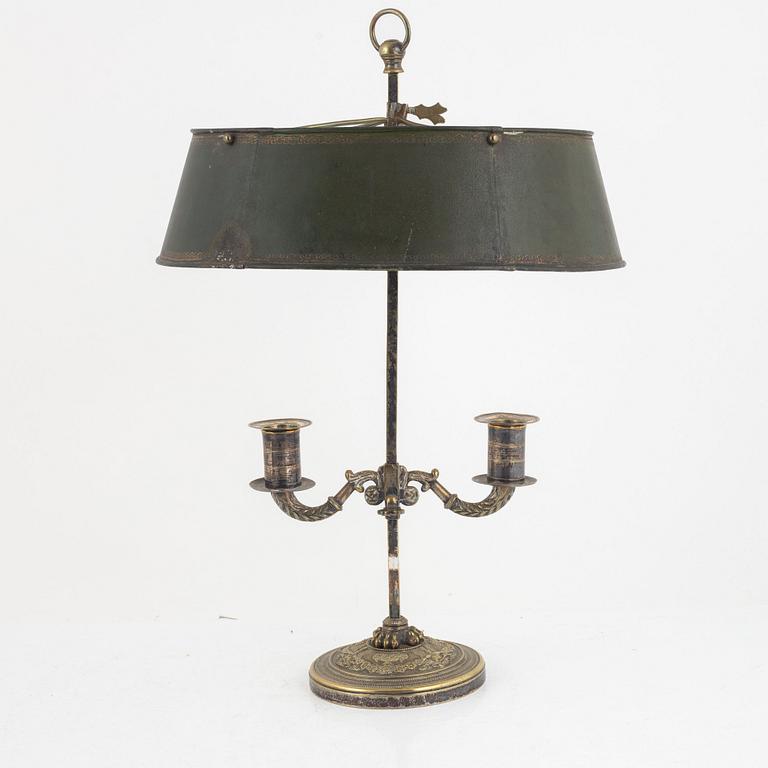 A French Empire silvered-bronze and tôle-peinte two-light reading light, early 19th century.