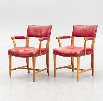 Josef Frank, a pair of mahogany and red leather model 695 armchairs, Svenskt Tenn, Sweden.