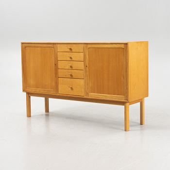 Sven Engström och Gunnar Myrstrand, an oak veneered sideboard, for Bodafors, dated 1962.