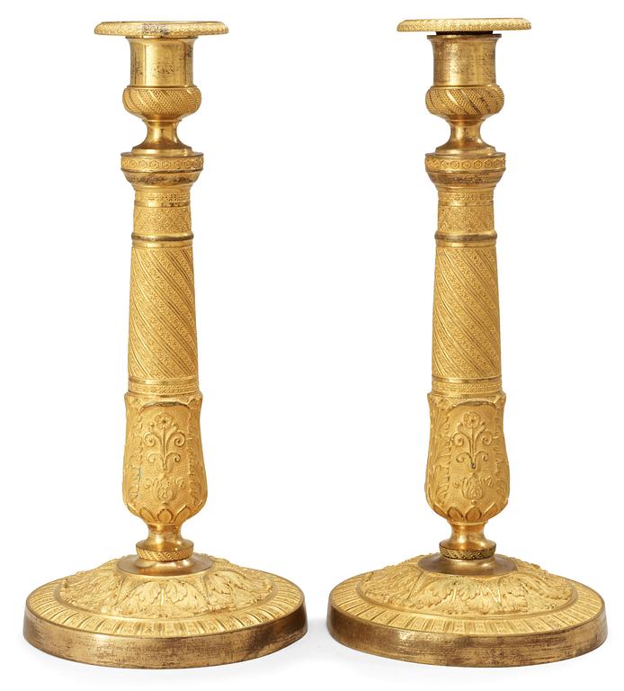 A pair of French Empire early 19th Century candlesticks.