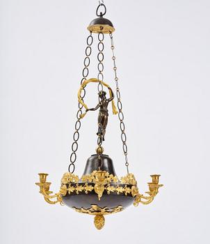 A patinated and ormolu six-light Empire chandelier, Stockholm, first part 19th century.