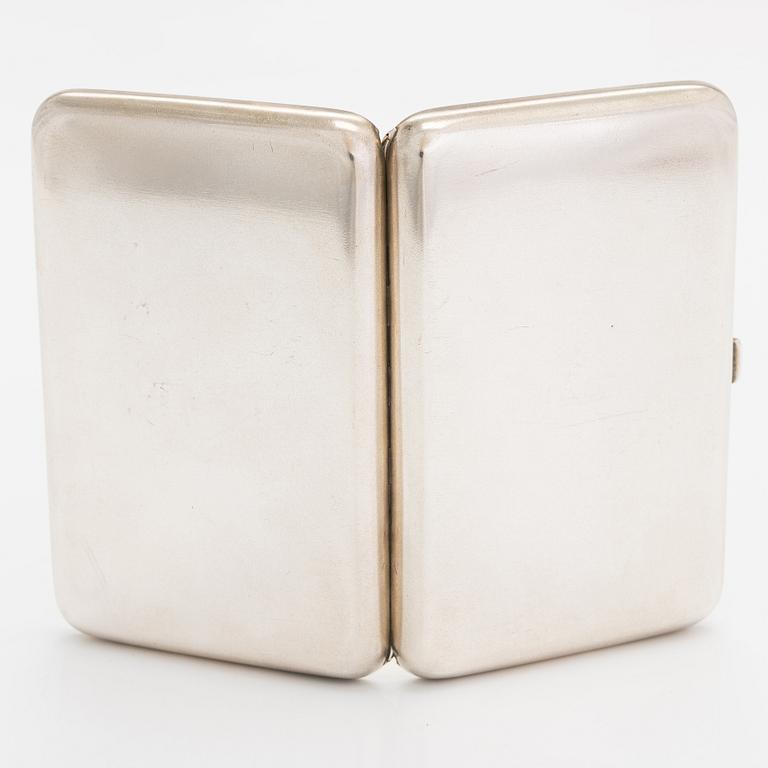 A silver cigarette case, Hlebnikov,  Imperial warrant, unidentified maker's mark, Moscow 1899-1908.