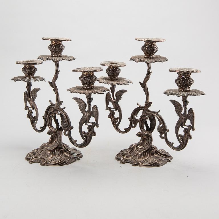 A pair of Swedish silver candelabra mark of GUSTAF MÖLLENBORG Stockholm 1846 , total weight ca 4420 gr, height 31 cm.