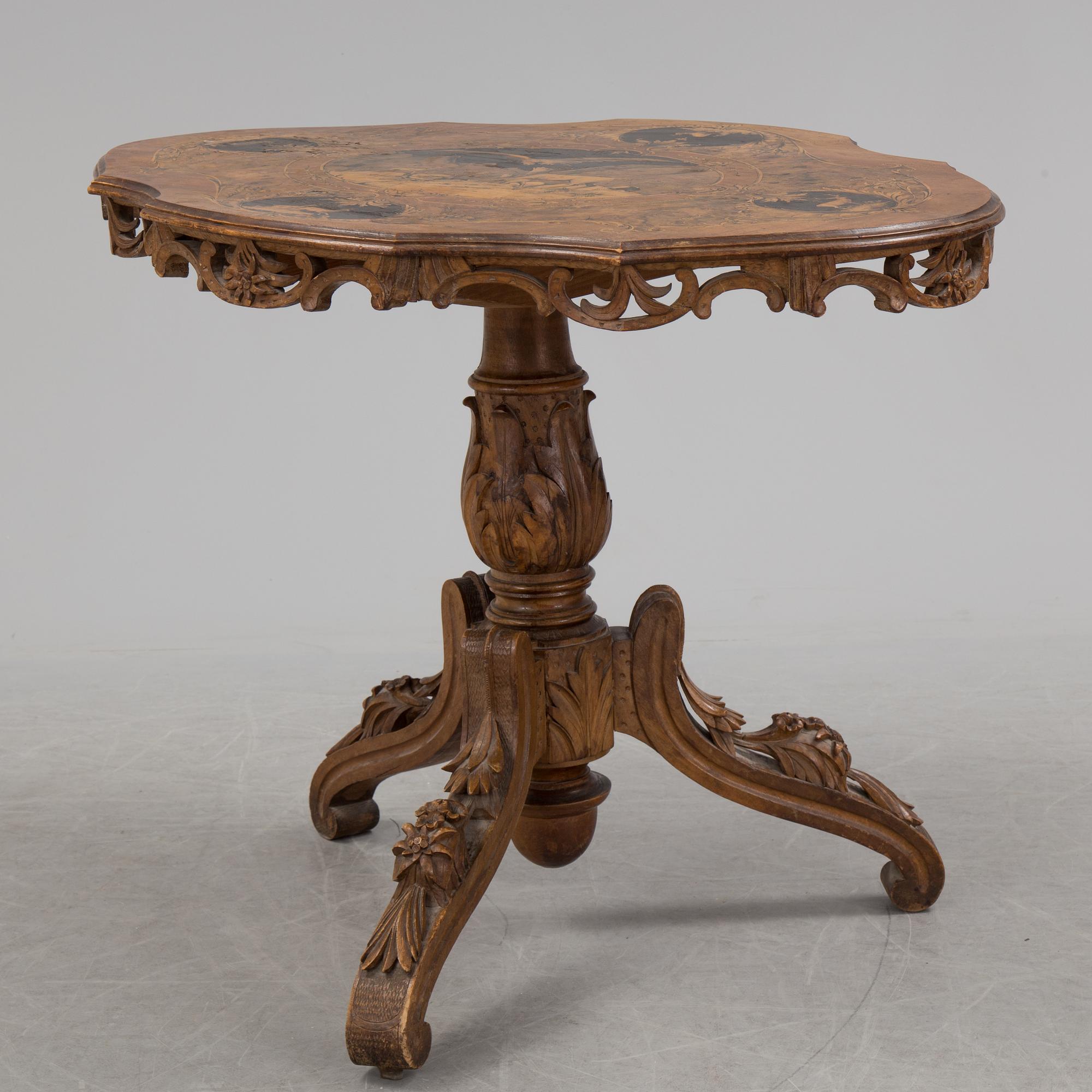 A Neo-Rococo inlay table, late 19th Century. - Bukowskis