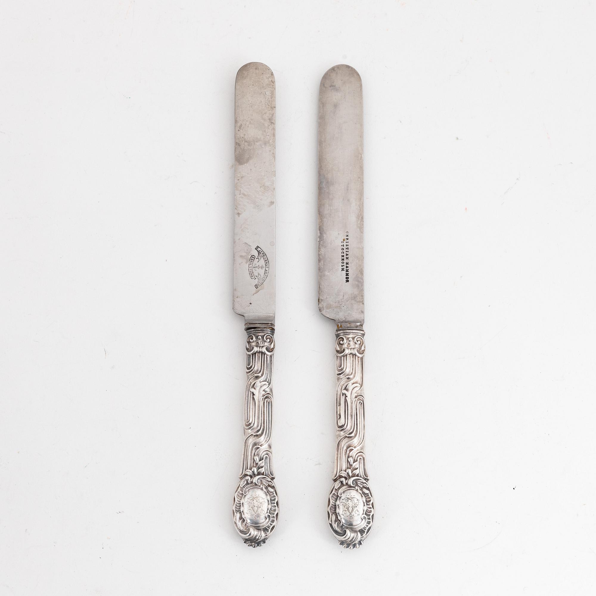 Twelve Swedish rococo-revival silver knives, mark of Christian Hammer, Stockholm 1857-1880.