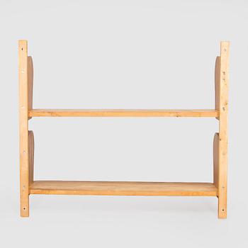 A mid-20th century 'Poika' wall shelf by HMN Huonekaluliike Mikko Nupponen.