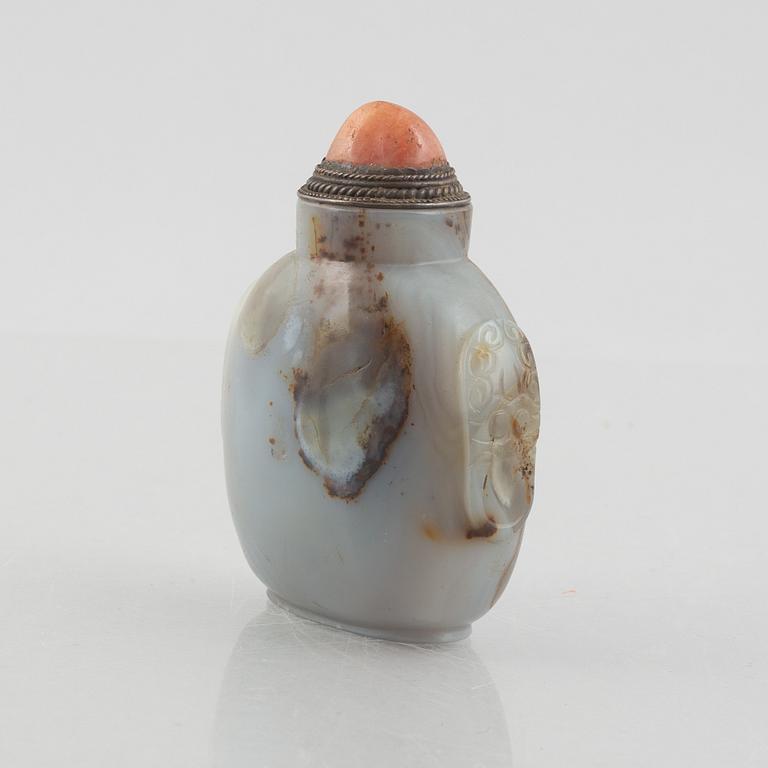 A group of three Chinese stone snuffbottles, 20th century.