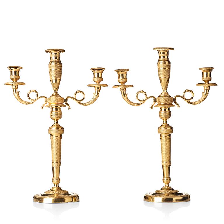 A pair of French Empire three-light candelabra, beginning of 19th century.