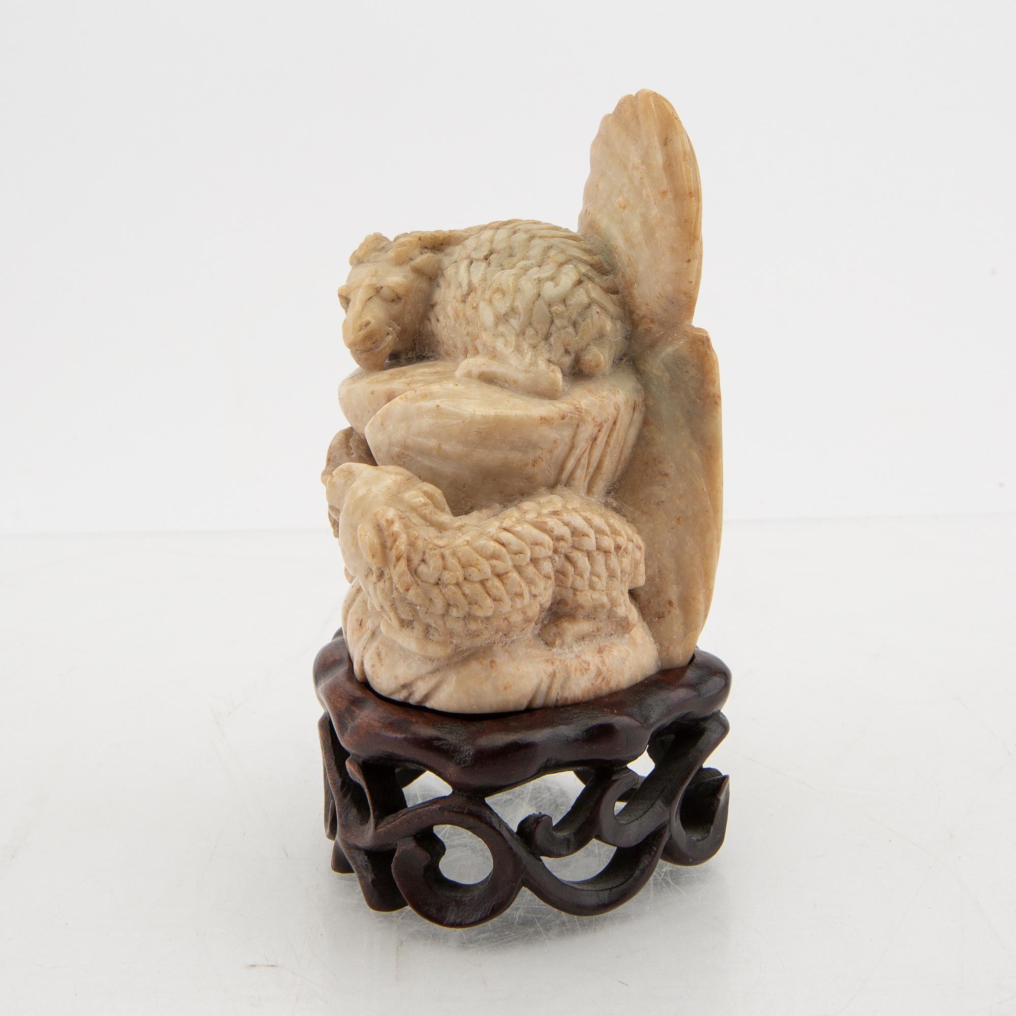 A Chinese stone sculpture 20th century.