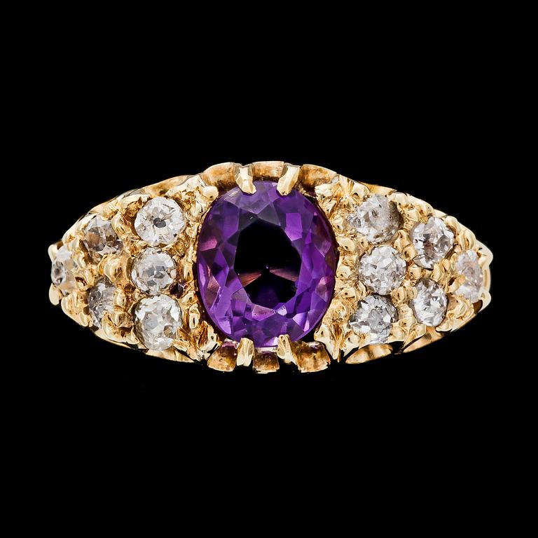 RING, 18k guld med ametist och antikslipade diamanter, tot ca 0.96 ct, Birmingham, England.