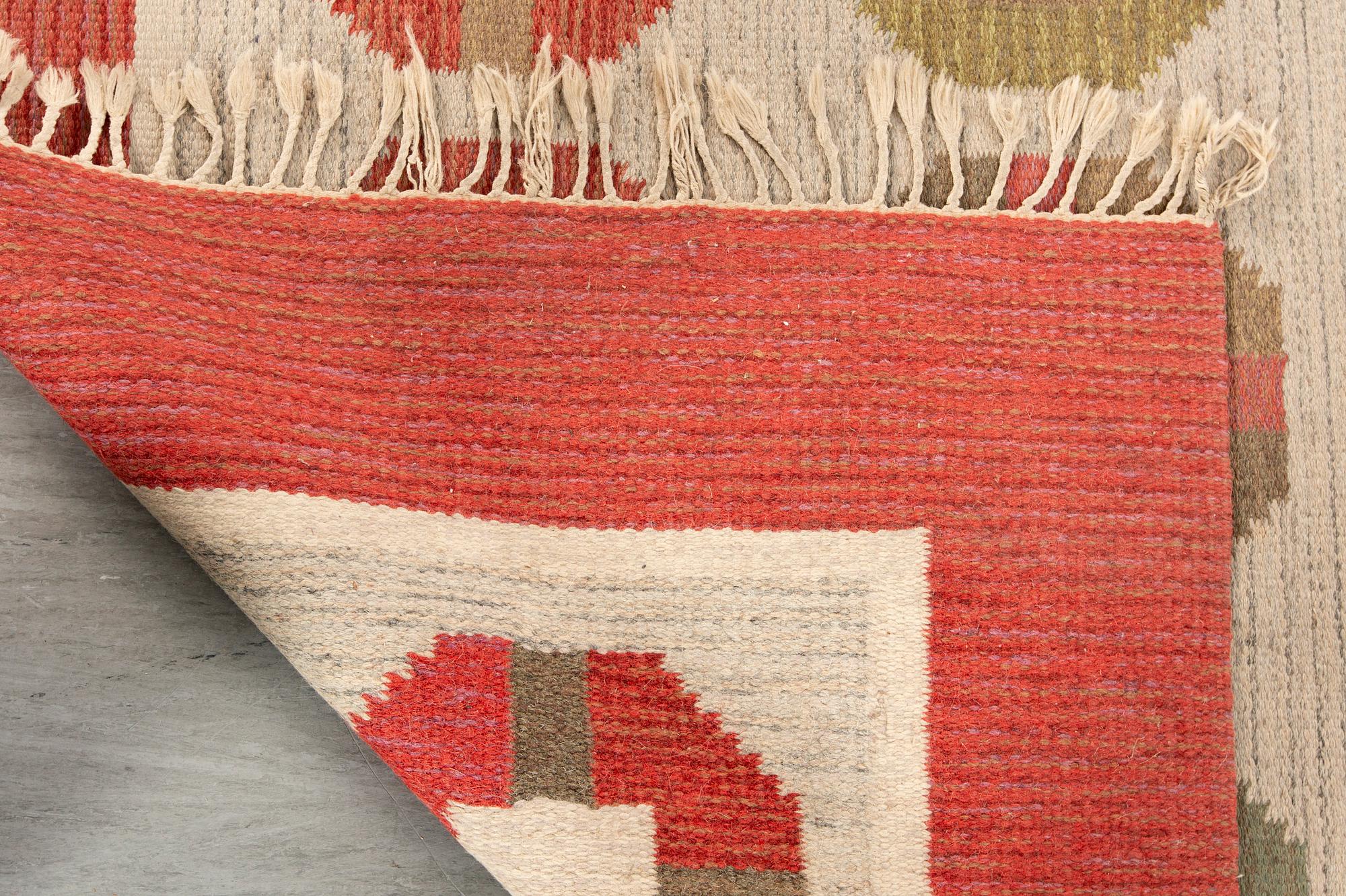 BIRGITTA SÖDERGREN, a signed flat weave carpet ca 240 x 160 cm.