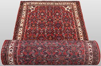 A Hosseinabad runner carpet, 500 x 93 cm.