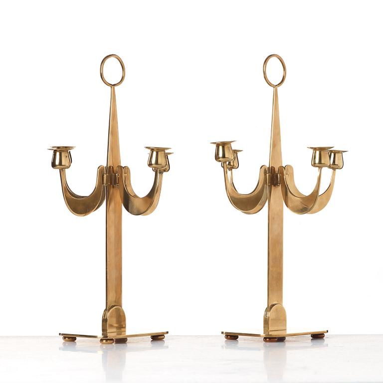 Josef Frank, a pair of brass candelabra by Svenskt Tenn, 1950's, model nr 2663.