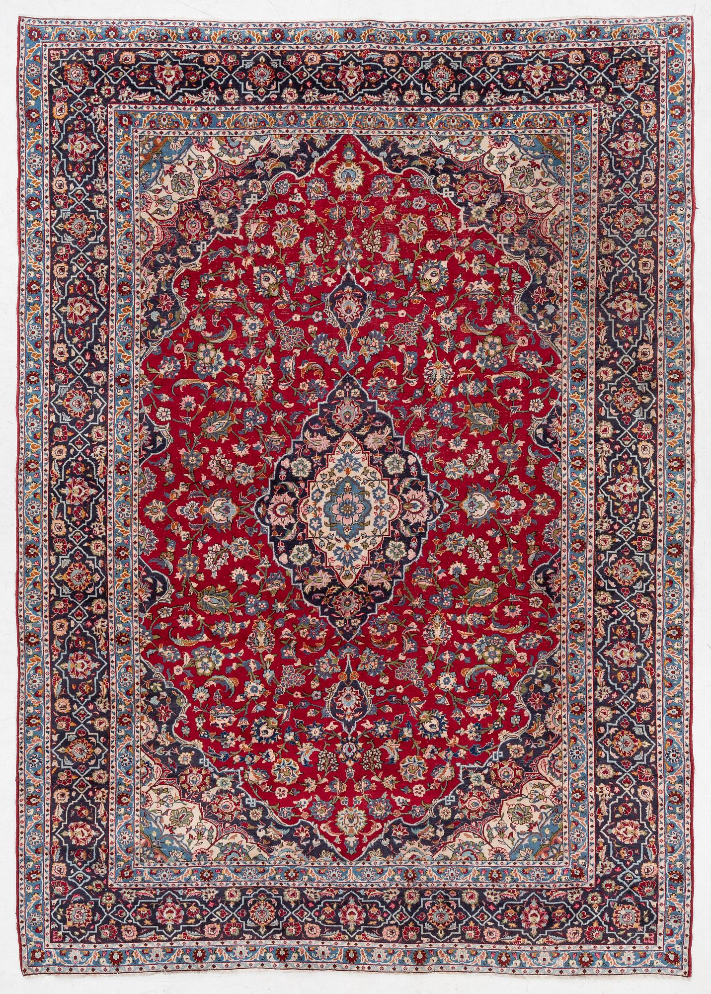 An oriental carpet, a. 419 x 295 cm.