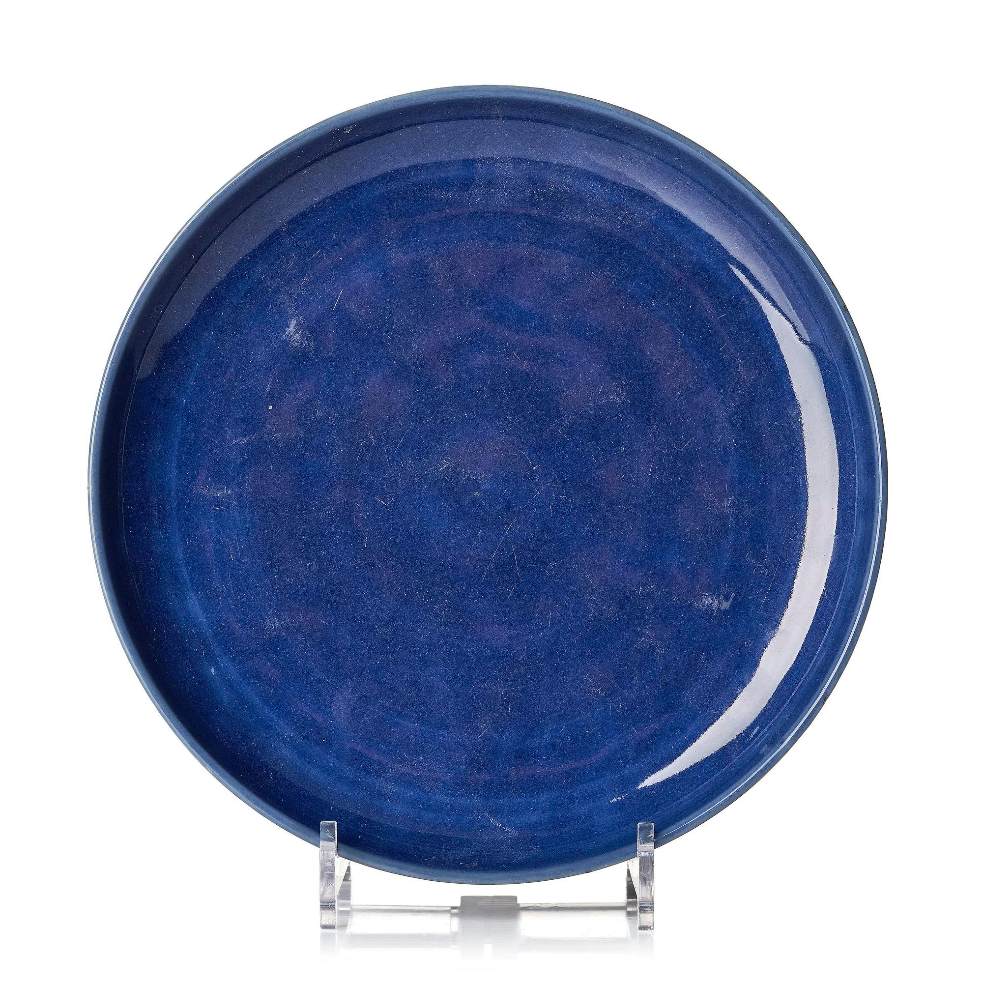 A blue glazed dish, Qing dynasty with an apocryphal four character mark of Chenghua.