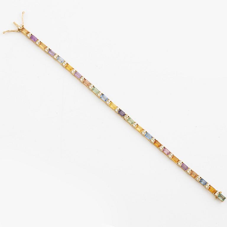 Bracelet 18K gold with multi-coloured sapphires and round brilliant-cut diamonds.