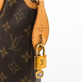Louis Vuitton, a 'Lockit PM' bag.