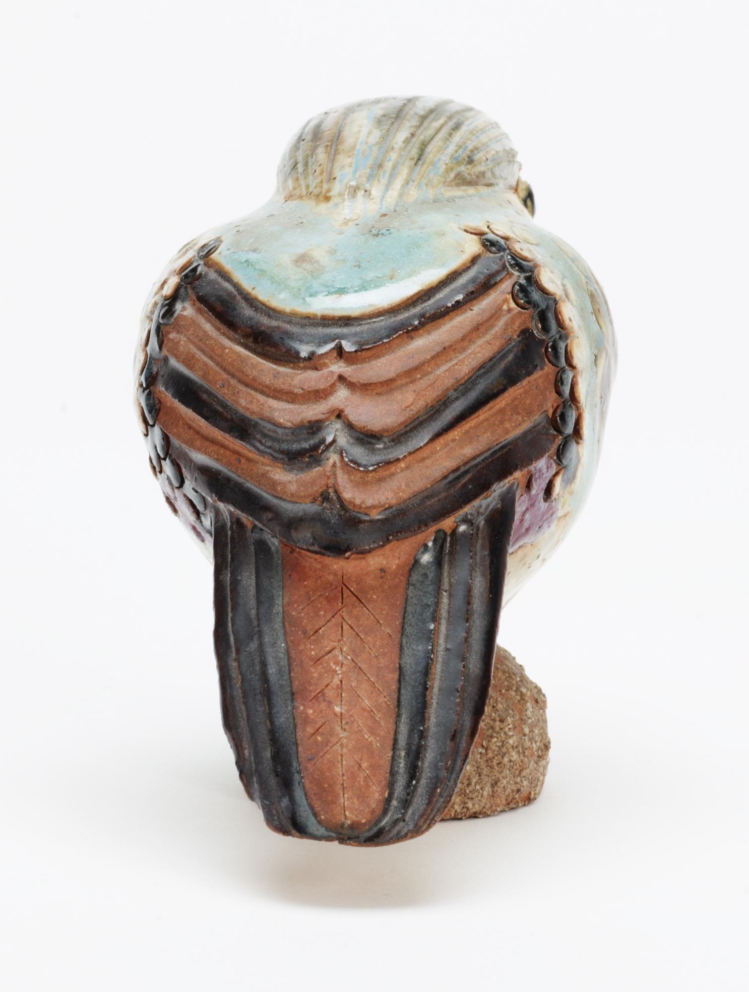 A Tyra Lundgren stoneware bird, signed with a seal.