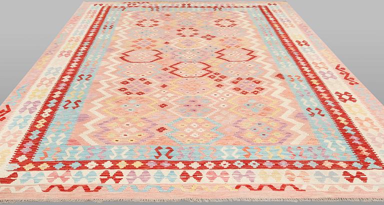 A Kelim carpet, c. 343 x 256 cm.