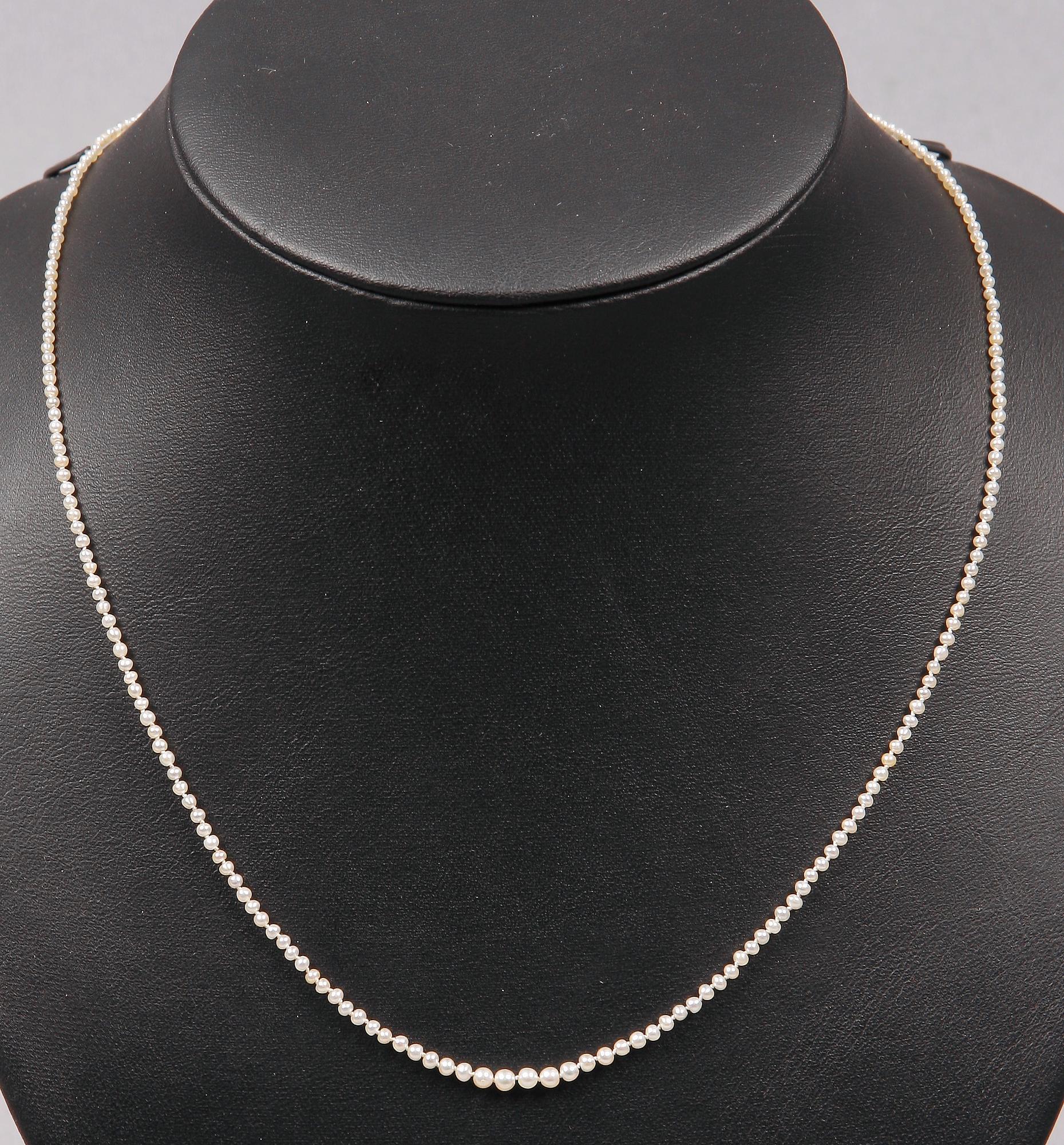 PÄRLCOLLIER, metalllås, 1900-talets första hälft.