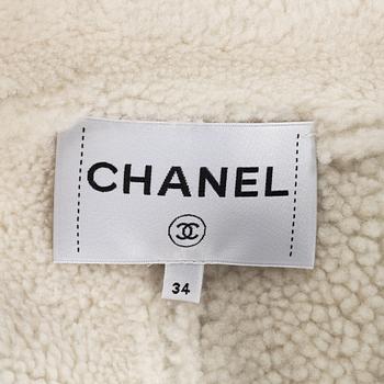 Chanel, kappa, storlek 34.