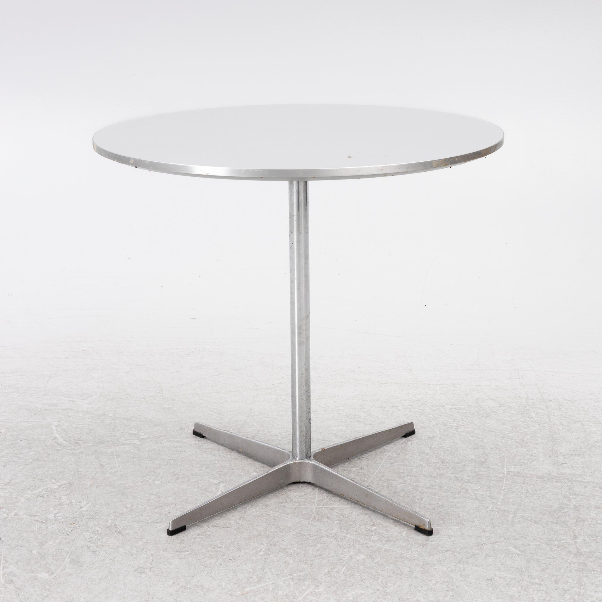 Arne Jacobsen, A coffee table, by Fritz Hansen, dated 2000.
