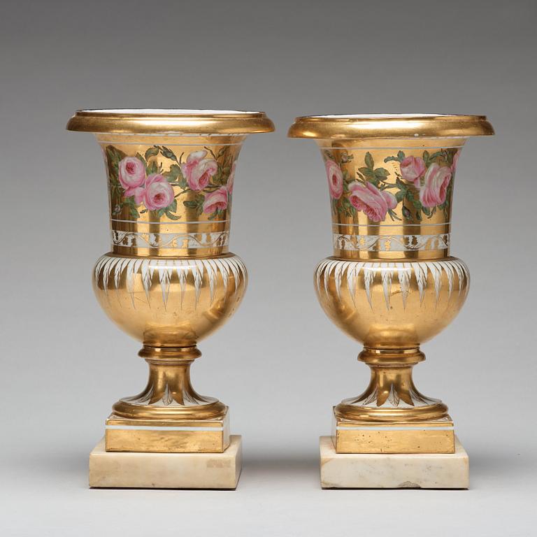 A pair of French urns, 19th Century.