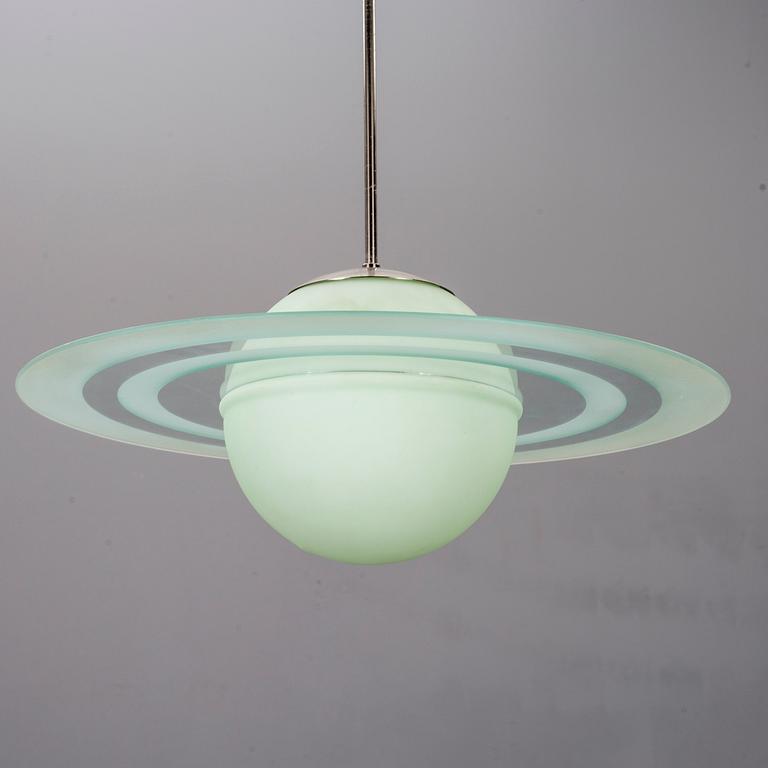 TAKLAMPA, "Saturnus", 1900-talets andra hälft.