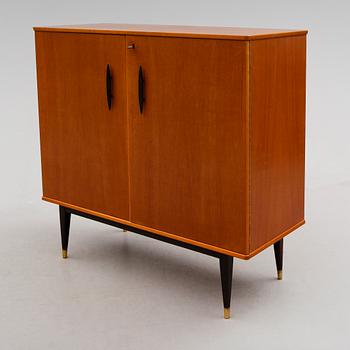 SKÅP, 1900-talets mitt.