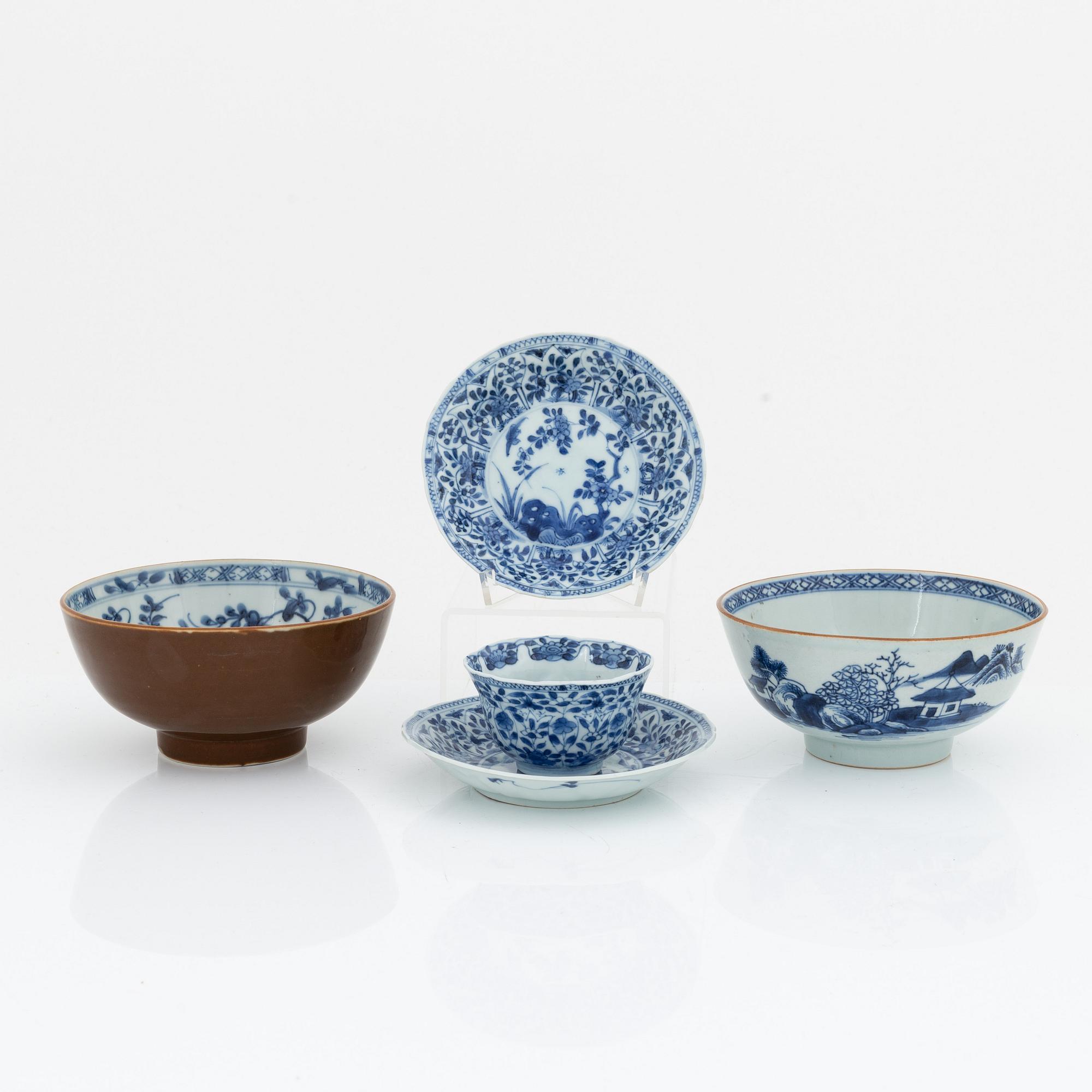 Two blue and white bowls, and a cup with two stands, Qing dynasty, 18th Century.