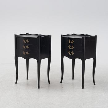 A pair of painted Rococo style bedside tables, second half of the 20th Century.