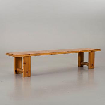 A PINE WOOD BENCH.