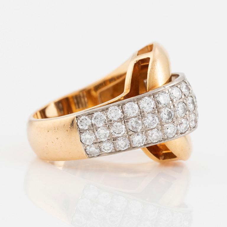 Gold and brilliant cut diamond ring.