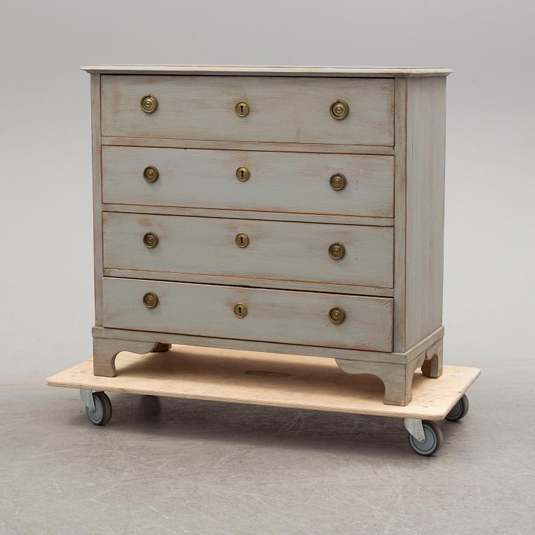 A mid 19th century painted chest of drawers.