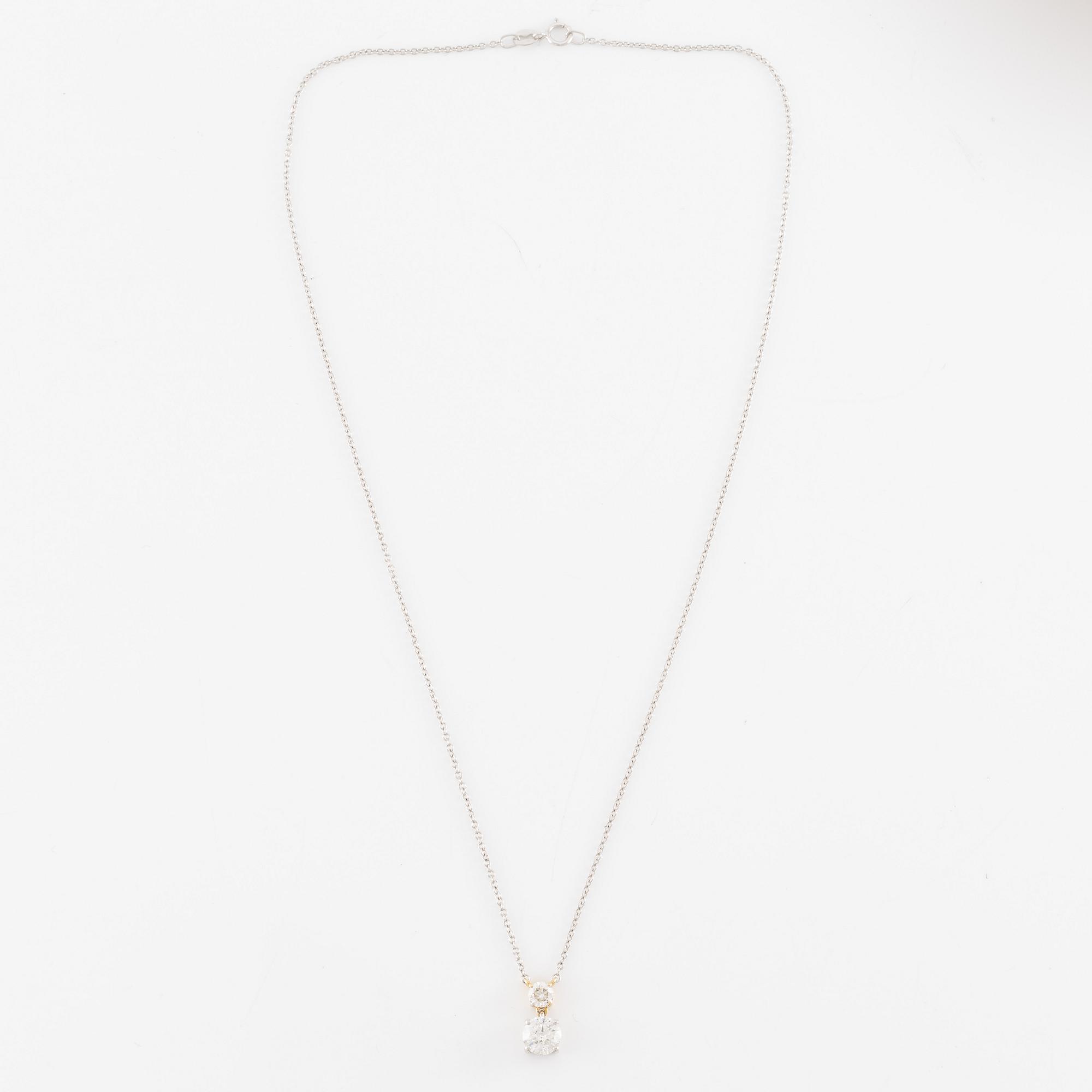 Collier 18K guld med två briljantslipade diamanter, medföljande report IGI.