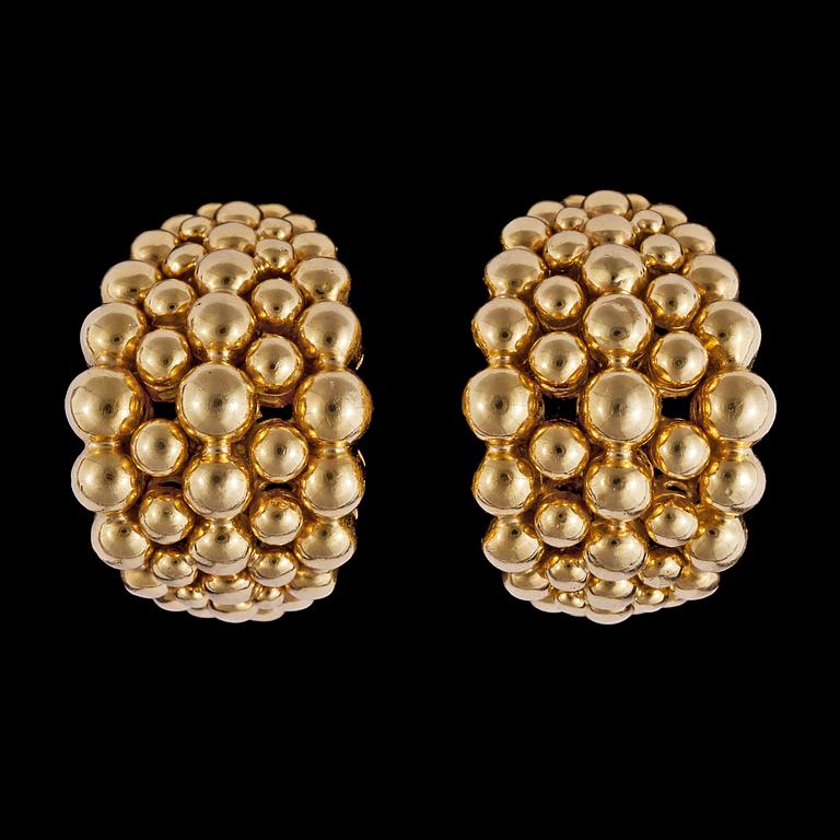 A pair of Boucheron gold earclips.
