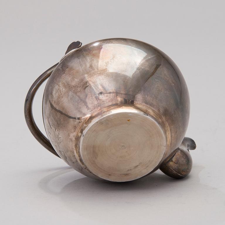 A Korean Silver Tea Pot.