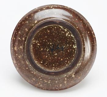 A Hans Hedberg faience bottle with stopper.