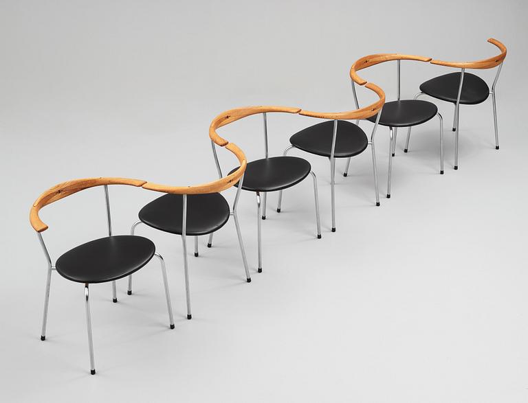Hans J. Wegner, a set of six "JH-701" oak and black leather chairs by Johannes Hansen, Denmark.