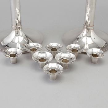 RICHARD FOX, a pair of three armed, four light sterling candelabra, London, 2001 and 2013.