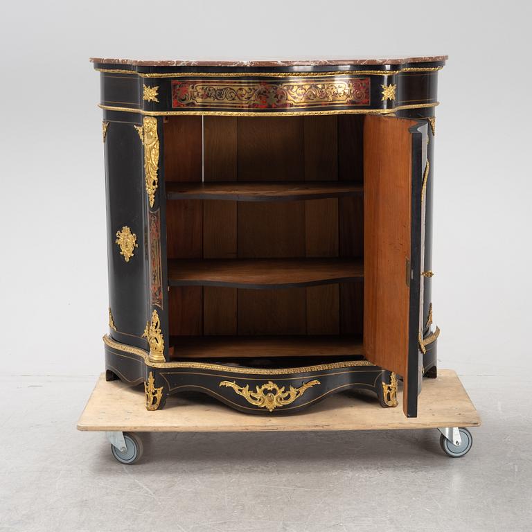 A Boulle style cabinet, the end of the 19th century.
