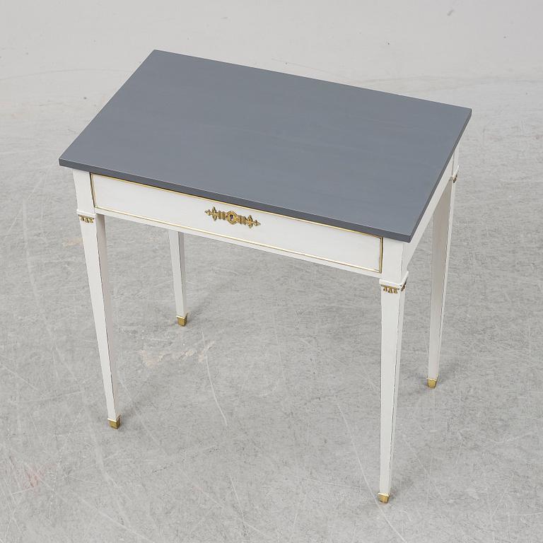 A Gustavian style table, first half of the 20th century.