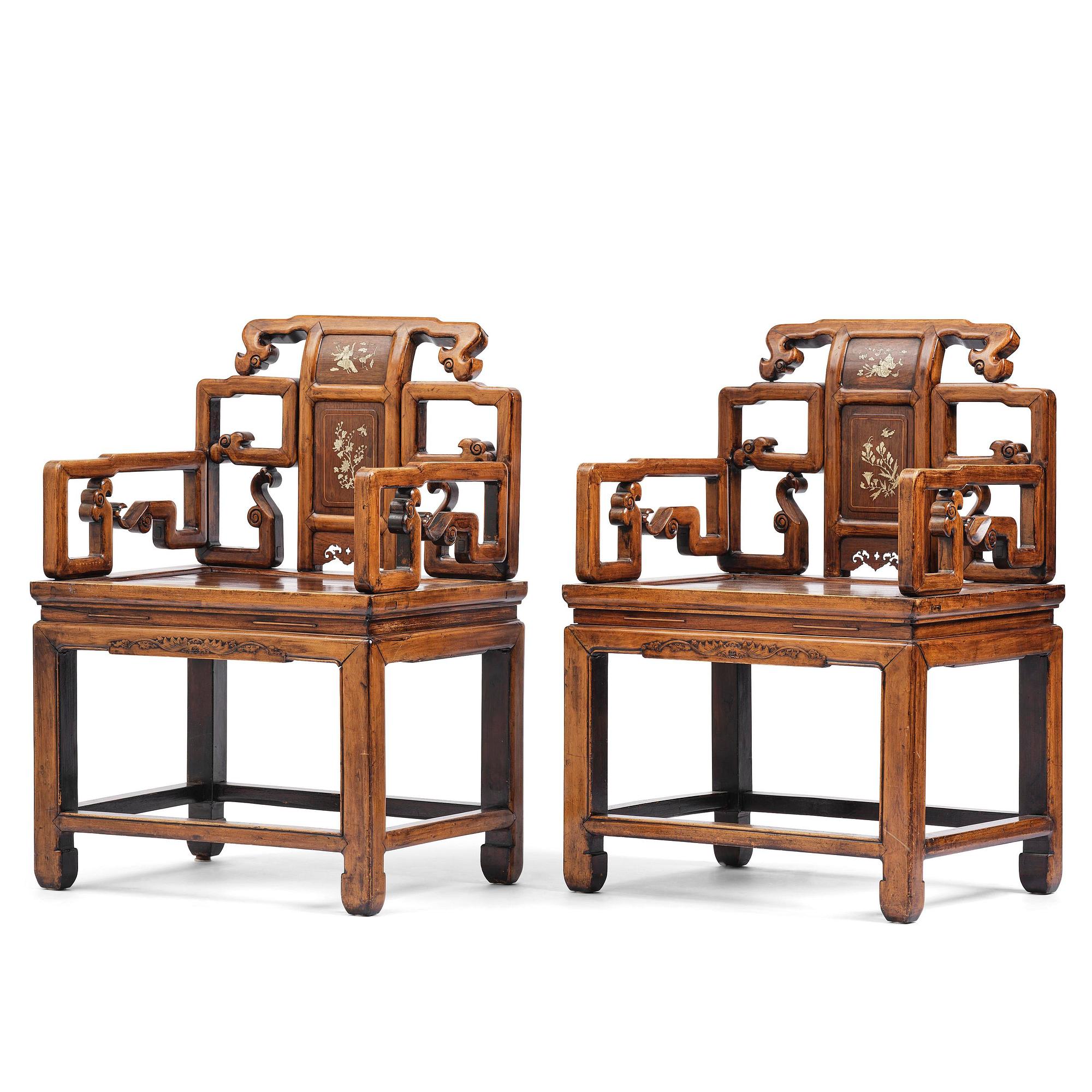 A pair of hardwood armchairs, late Qing dynasty.