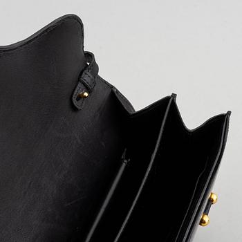 Hermès, a vintage leather bag.