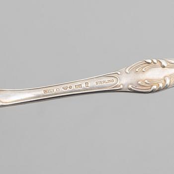 A set of 22 Swedish silver spoons, including Bernt Erlandsson, Kristianstad 1879.