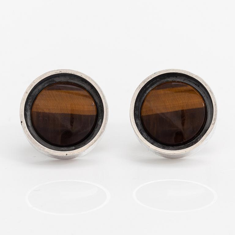 Elis Kauppi, A pair of silver cufflinks with tiger's eye. Kupittaan kulta, Turku 1966.