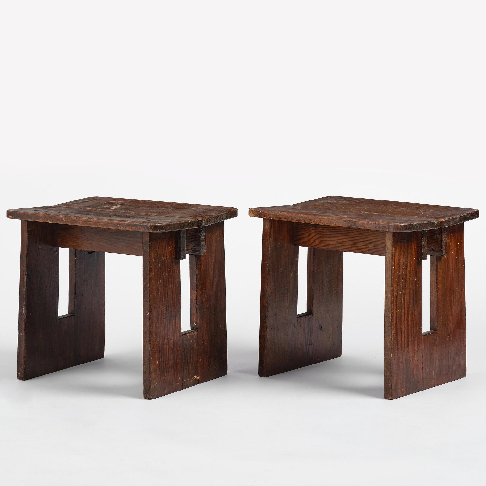 Axel Einar Hjorth, a pair of stained pine "Skoga" stools, Nordiska Kompaniet, Sweden, 1930s.