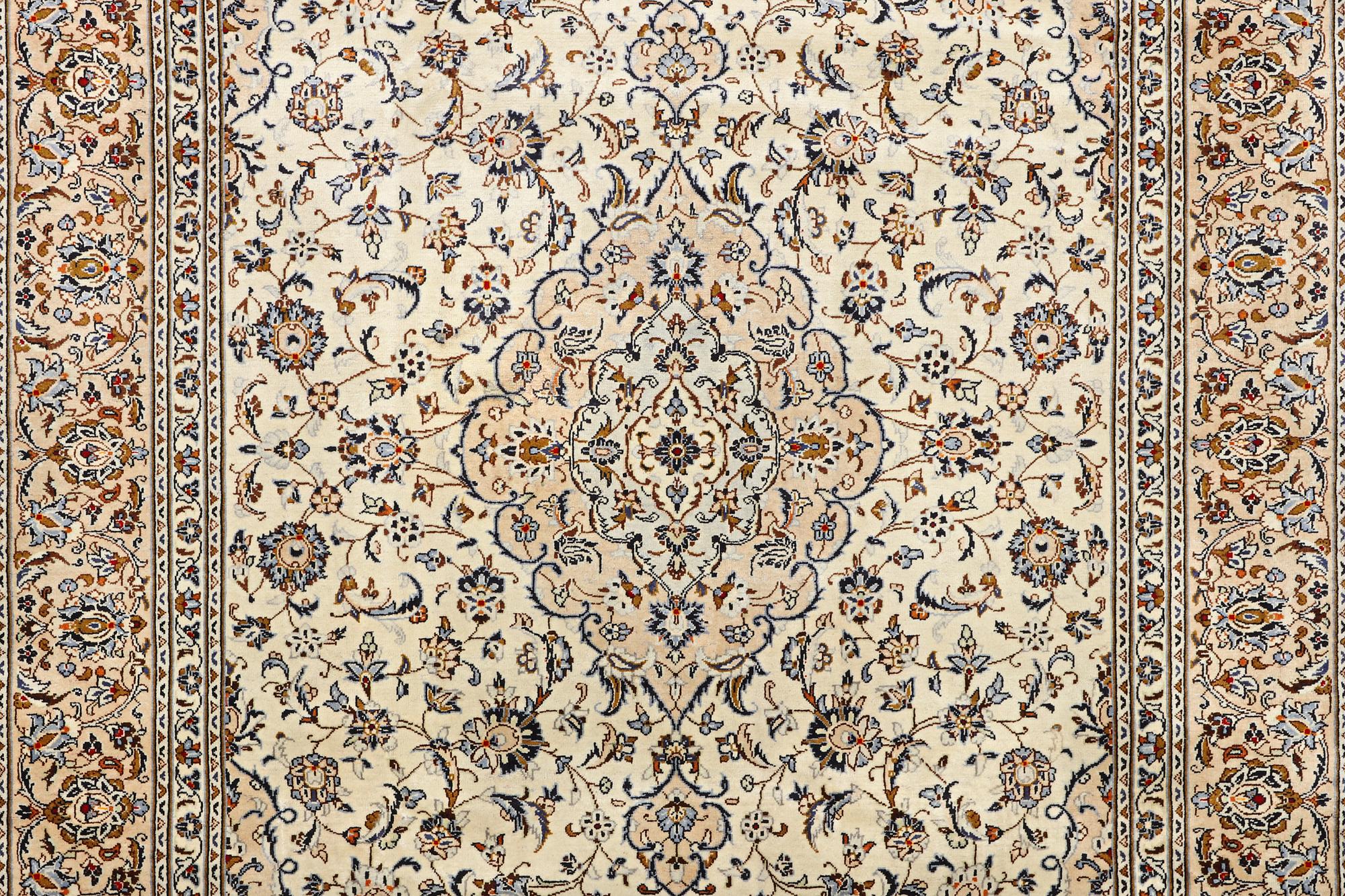 A Kashan carpet, c. 346 x 250 cm.