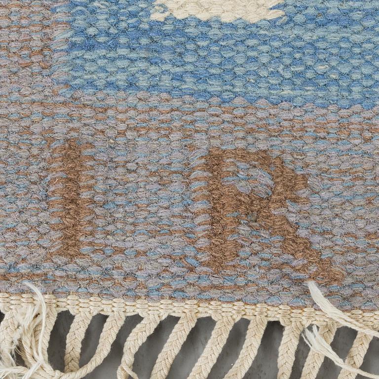 A signed flat weave carpet ca 195 x 139 cm.